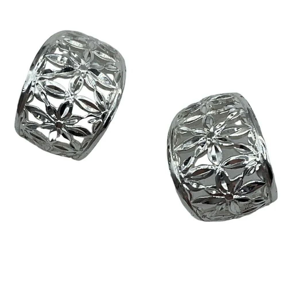 vintage sterling silver floral diamond cut half hoop earrings.